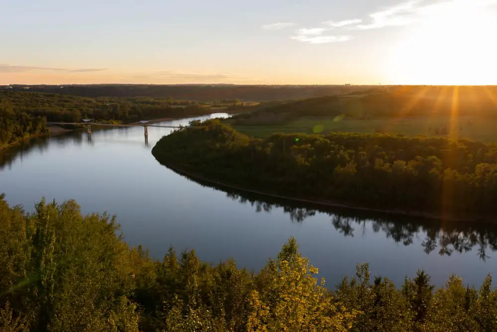 This is a look at the sunrise over the forests surrounding the Saskatchewan river.