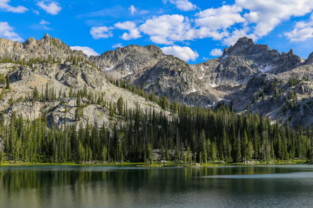 This is a view of Alice Lake, Sawtooth mountains and the forest wilderness in between.